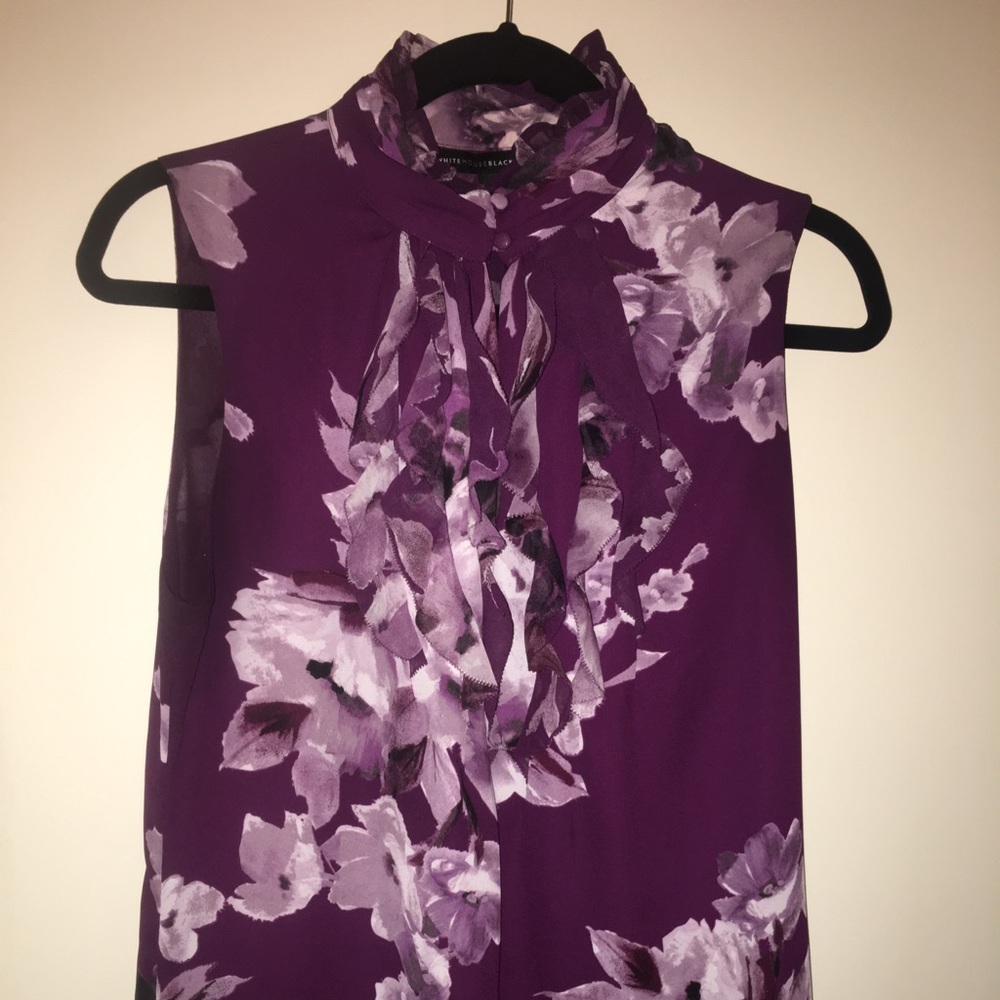 Purple White House Black Market shirt.